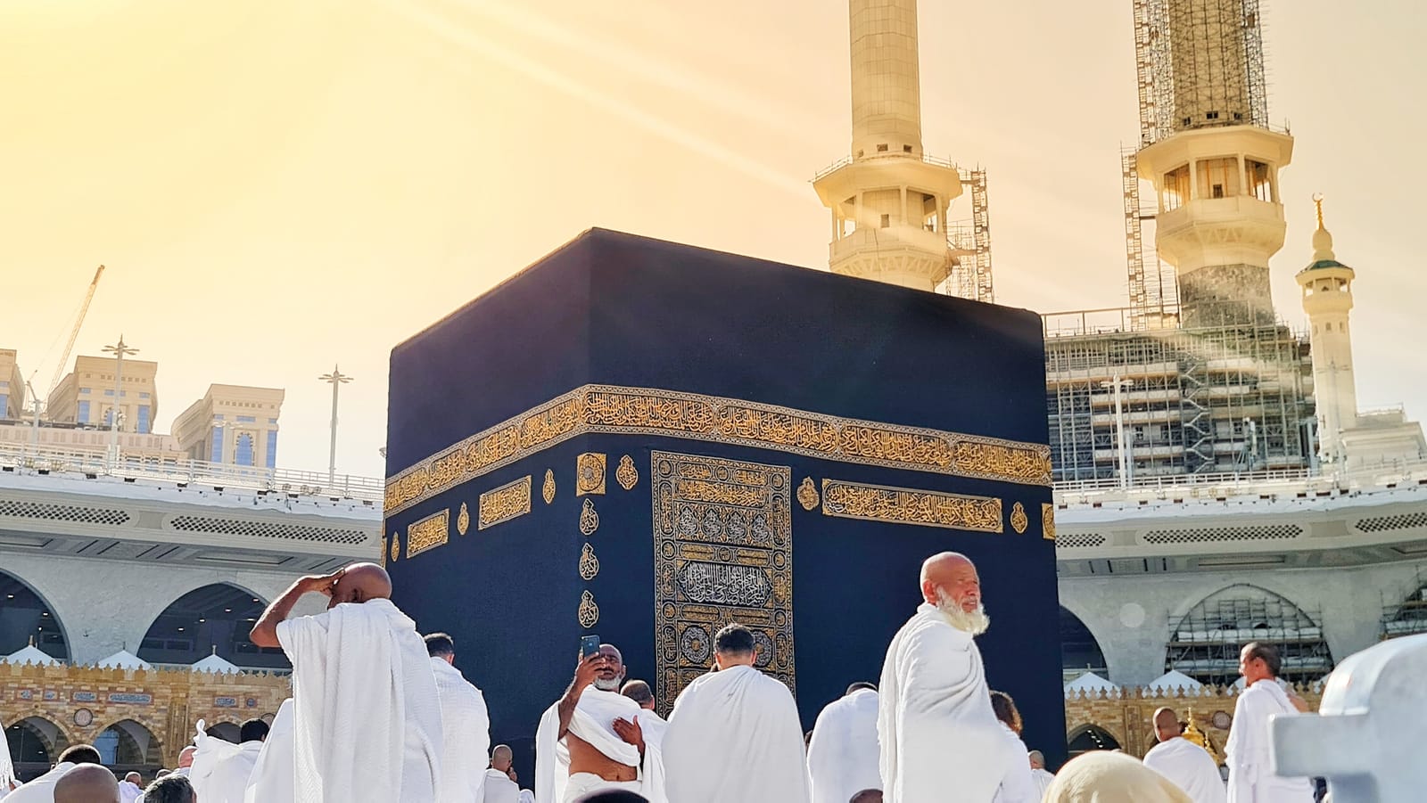 Pilgrims perform tawaf, circling the Kaaba at the Grand Mosque in Mecca