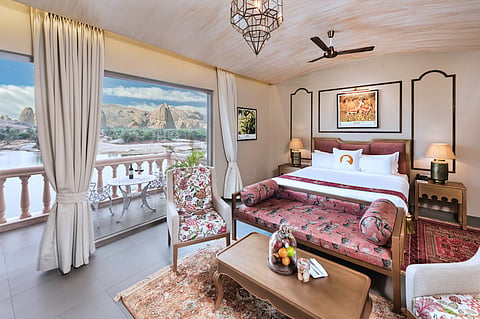 The Lake View Room features a private balcony that opens out to uninterrupted water views