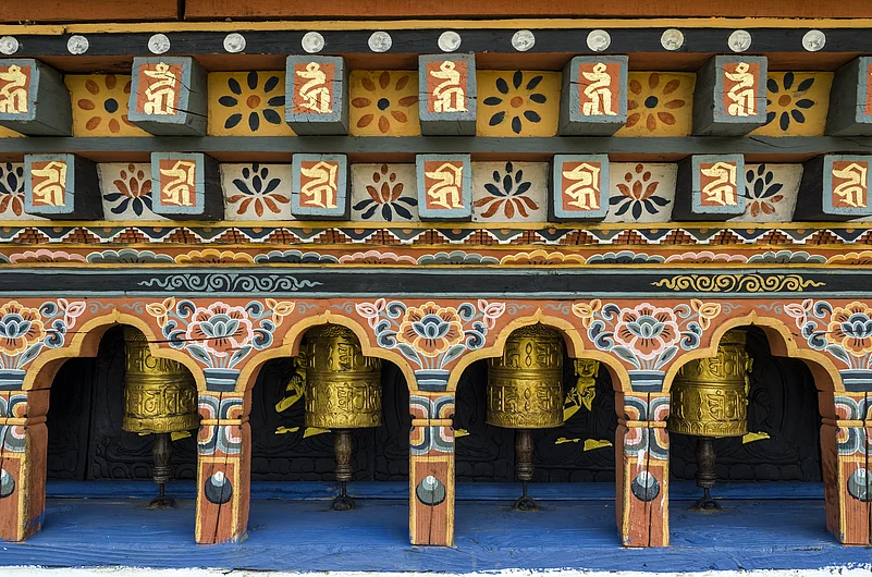 Prayer wheels at Chimi Lhakhang Monastery, one of Punakha’s most revered Buddhist sites