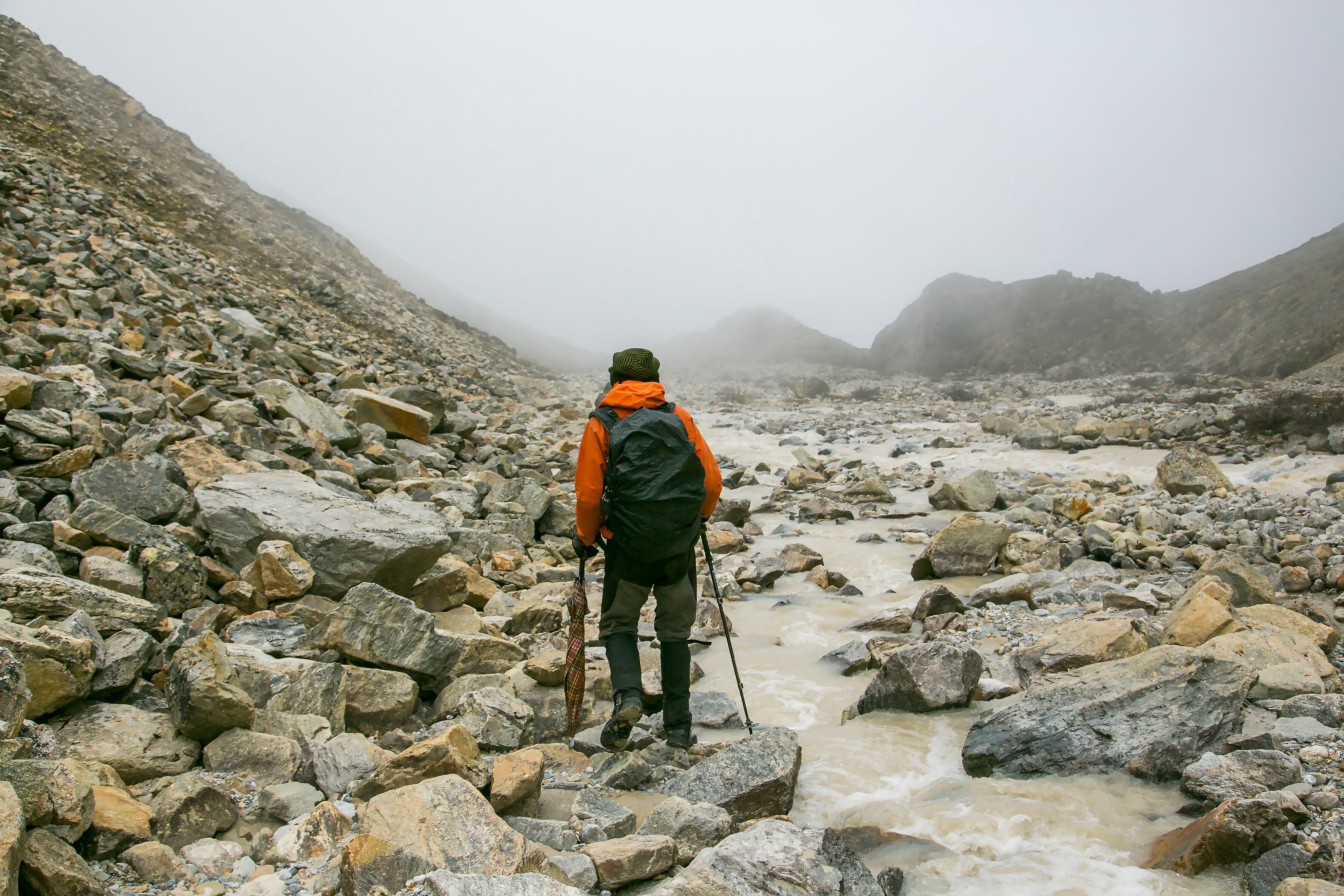 A hiking guide leads the way along the "Snowman Trek" of Bhutan