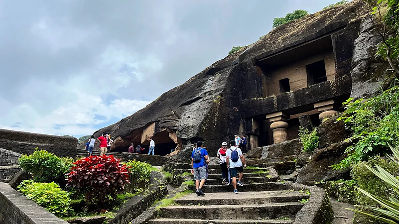 Visitors explore the centuries-old Kanheri Caves inside Sanjay Gandhi National Park