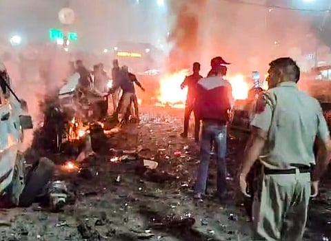 Smoke and debris filled the air near Delhi’s Red Fort after a powerful blast shook the area on Monday evening