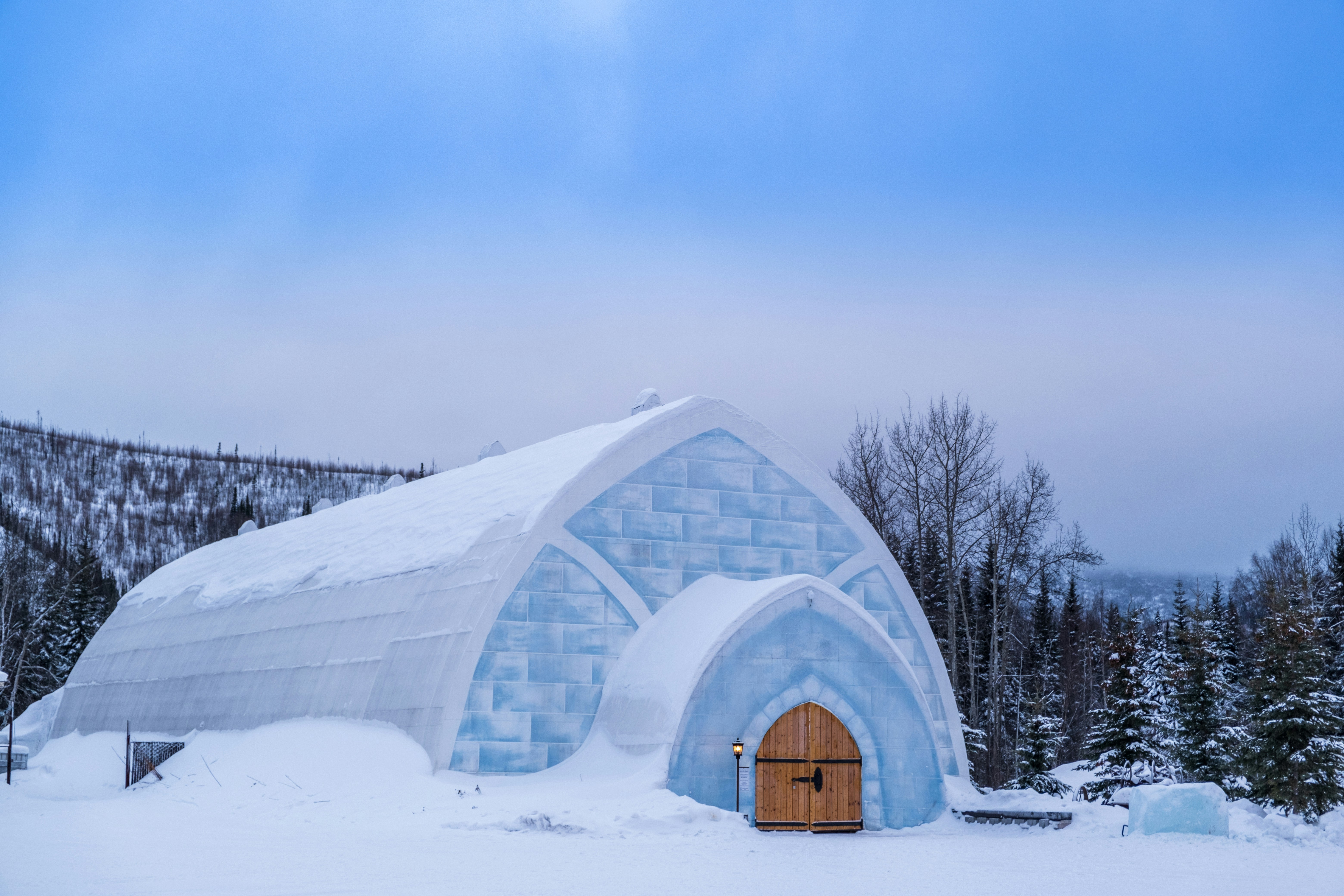 From crystal-clear ice bars to thermal sleeping arrangements, these snowbound retreats transform winter travel into an immersive and luxurious experience.