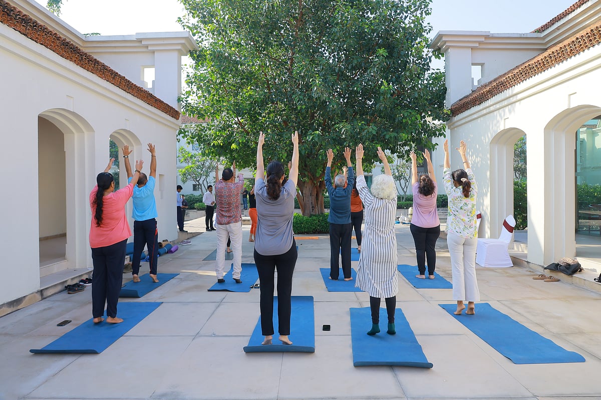 Morning yoga sessions at the Bhumisparsha centre help guests slow down