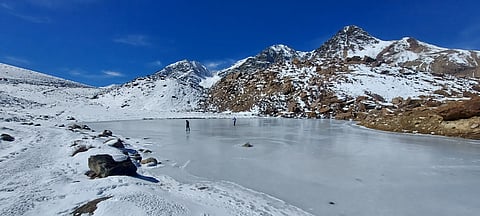 Tourists taking a walk on the ice