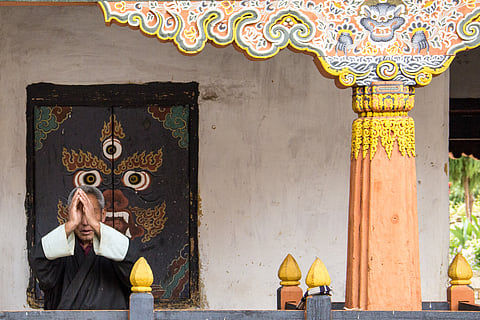 An old man offering his prayers