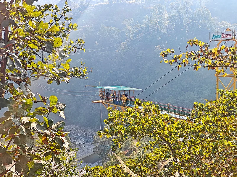 Adventure seekers gear up for a bungee jump at Jumpin Heights