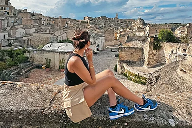 Photo: Sanjna Thakeria : The author against the backdrop of Materas ancient stones