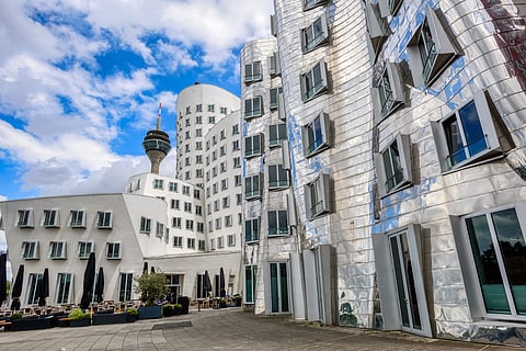The sculptural Neuer Zollhof complex shapes Düsseldorf’s futuristic Media Harbour
