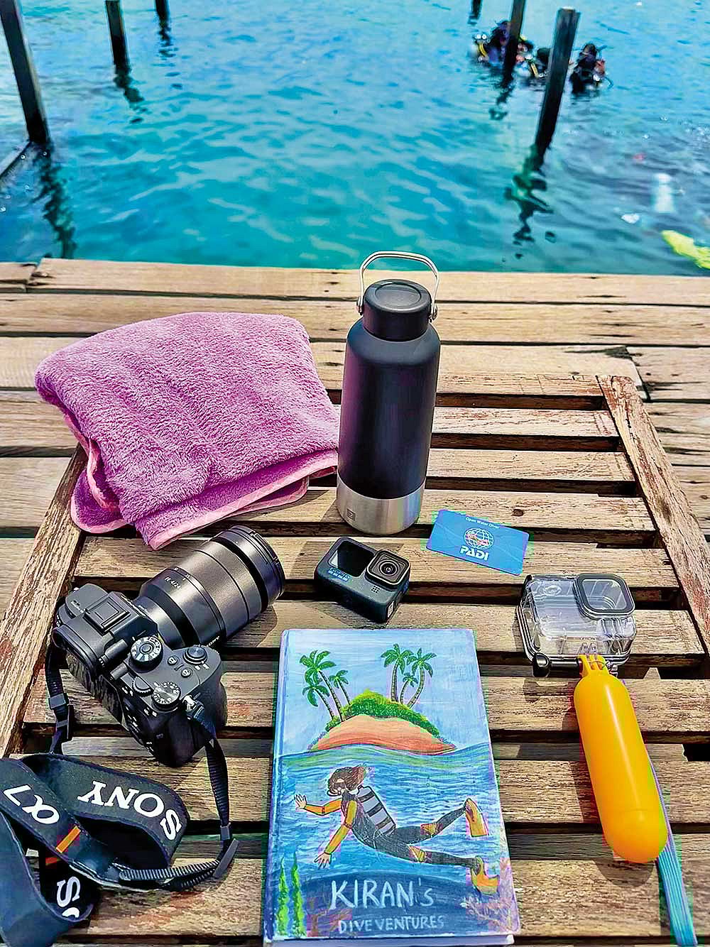 Surface interval routine: inspect equipment, take notes, prep cameras, hydrate