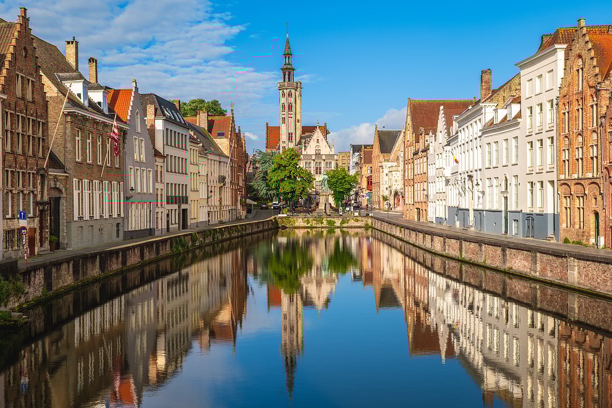 Morning light over Prague’s Charles Bridge and Old Town Tower