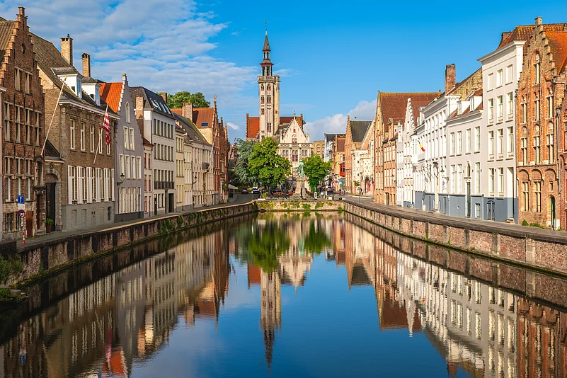 Morning light over Prague’s Charles Bridge and Old Town Tower
