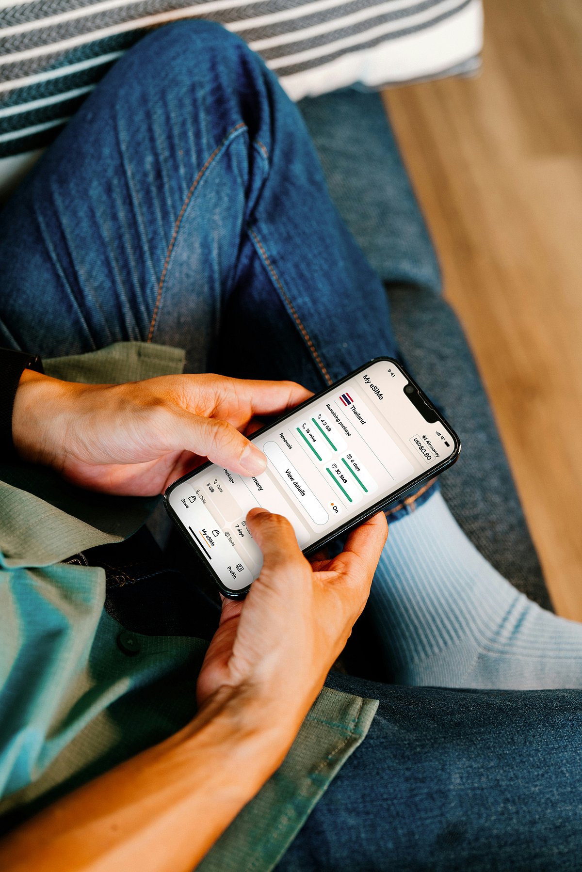 Unsplash : A person plans travel on phone (representational image)