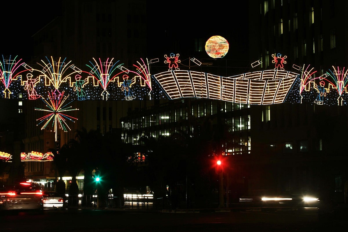 Festive light installations illuminate Cape Town streets during Christmas.