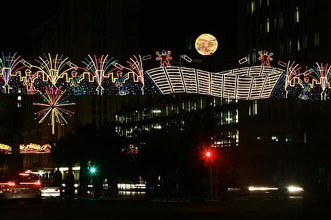 Festive light installations illuminate Cape Town streets during Christmas.