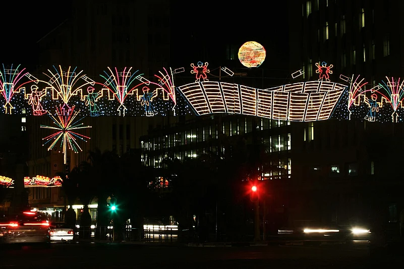 Festive light installations illuminate Cape Town streets during Christmas.
