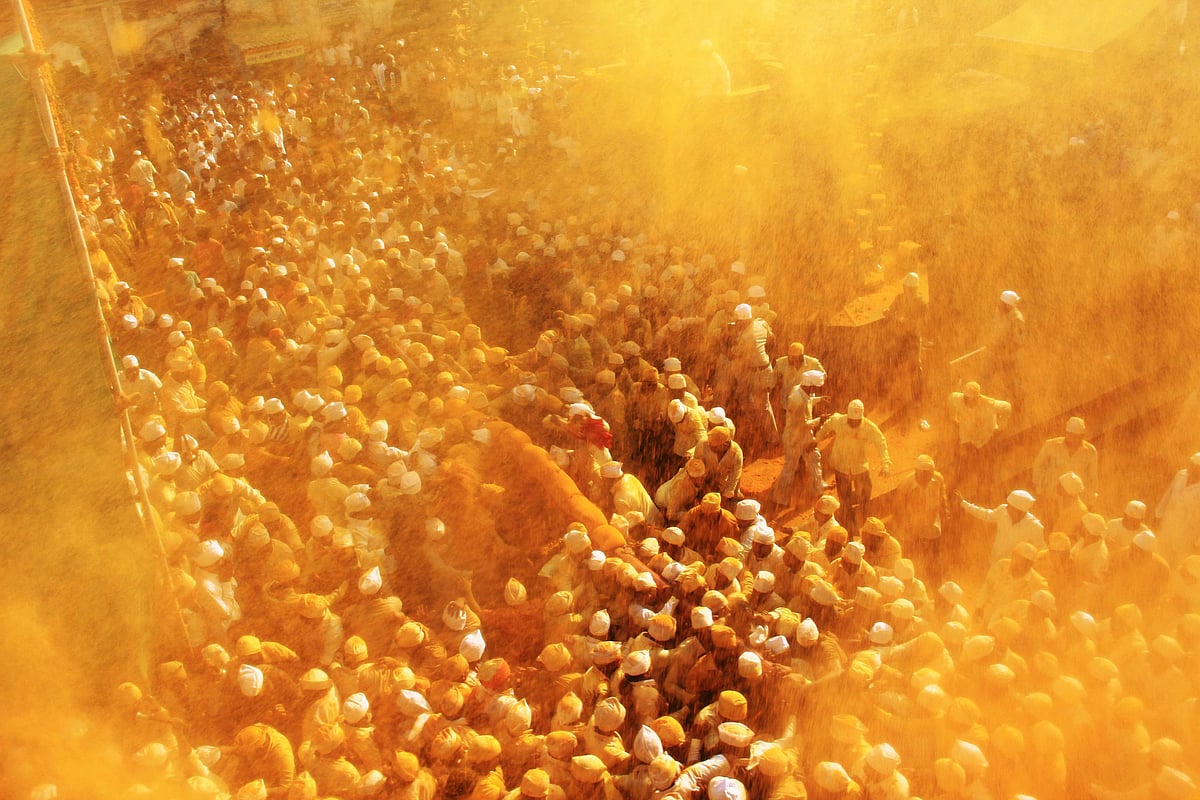 Devotees gather at Jejuri during the Bhandara festival, when turmeric is thrown as an offering