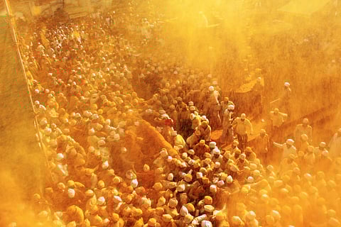 Devotees gather at Jejuri during the Bhandara festival, when turmeric is thrown as an offering