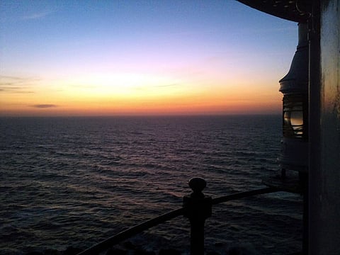 Jaigad Lighthouse stands on a rocky cliff offering sweeping views of the Arabian Sea