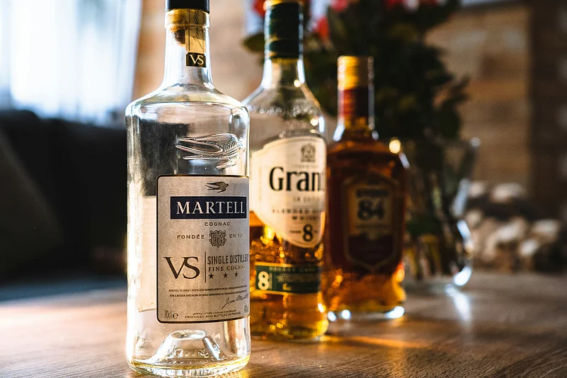 Travellers carrying liquor must comply with DGCA guidelines, airline policies, and state laws to avoid confiscation or delays at the airport