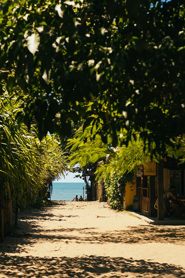 People enjoy a coastal getaway - Unsplash