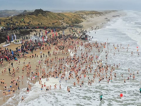 On the last day of the year in Søndervig, Danes are taking this tradition to the next level – by turning a small jump into a big, chilly splash with a plunge straight into the North Sea