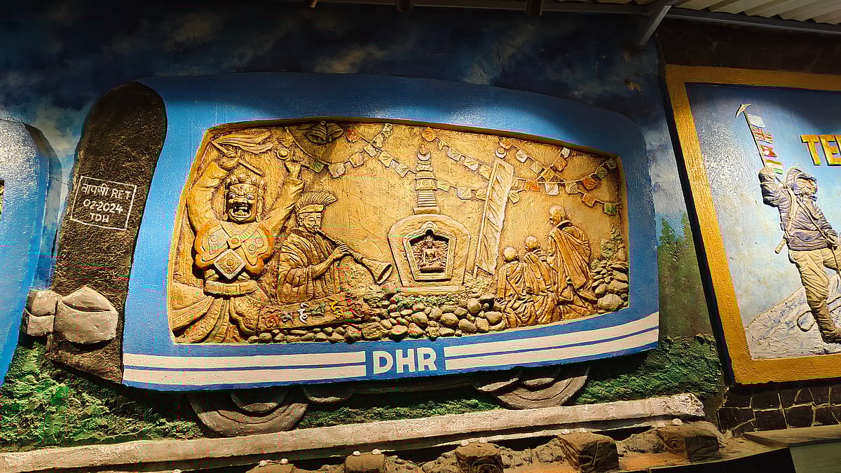 Murals alongside the path that leads to Mall Road, Darjeeling 