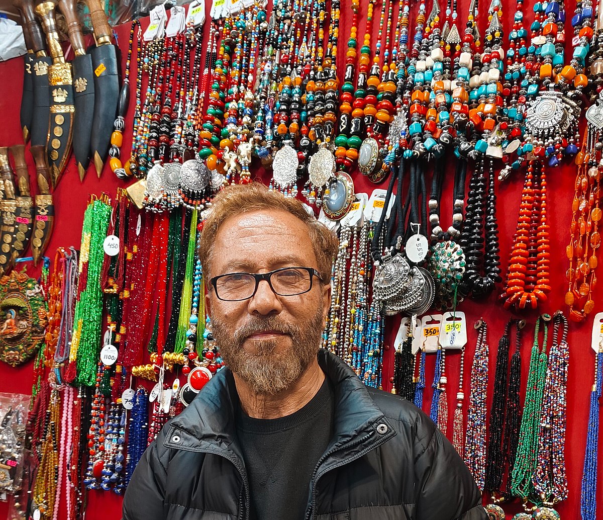 A curio shop owner in Darjeeling