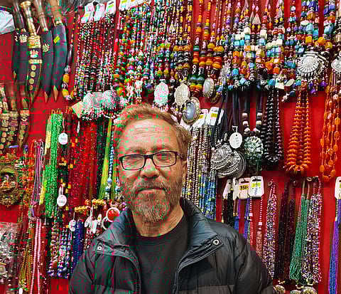 A curio shop owner in Darjeeling
