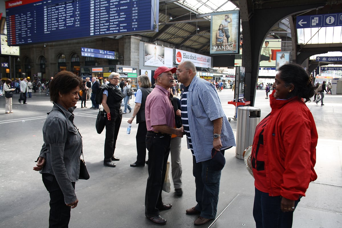 Rene greets his son Alexandre at the station, while my aunt Rita and me look on