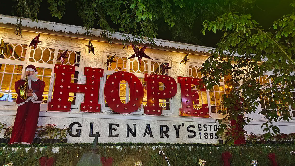 Tourists flock in front of Glenarys in Darjeeling for photographs
