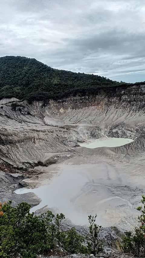 Clouds drift over Tangkuban Parahu