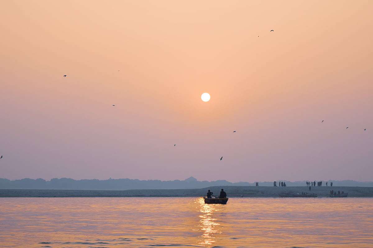 Sunrise over the River Ganga at a ghat in Varanasi
