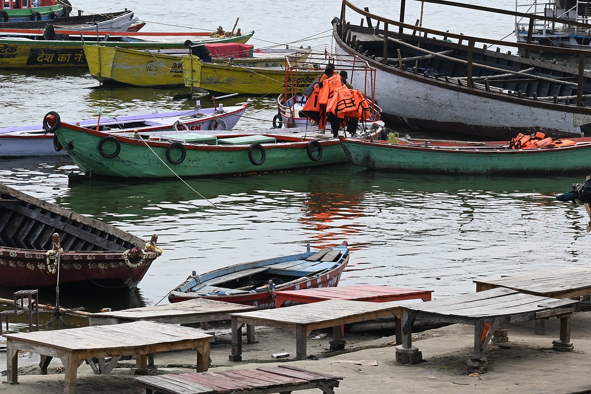 Boats moving along the River Ganga in Varanasi