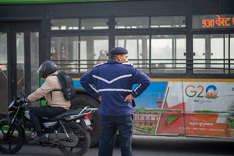 Traffic Police regulate vehicles at Connaught Place in central Delhi