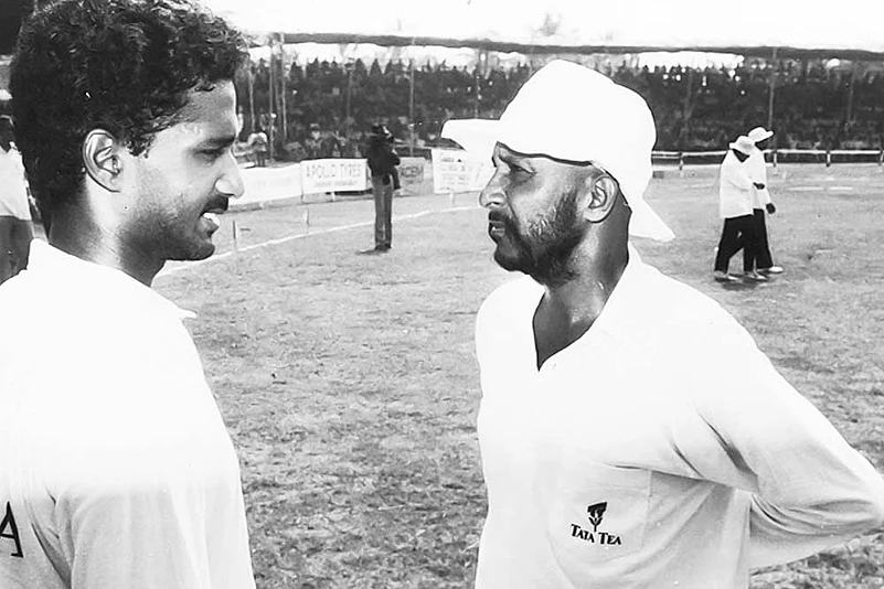 Indian cricketer Syed Kirmani (right)