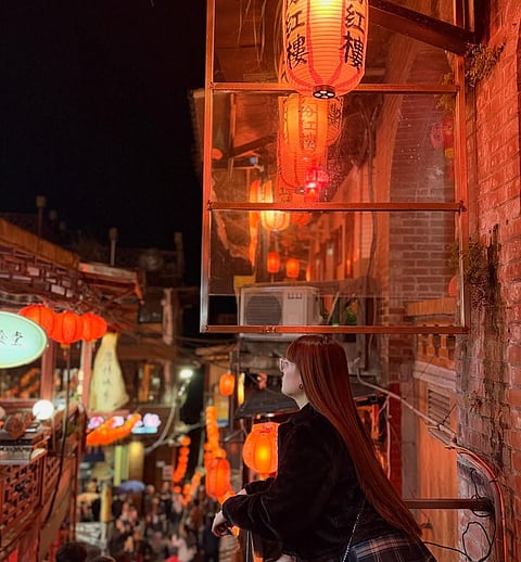 Explore the misty, nostalgic streets, glowing red lanterns, and winding alleyways of Jiufen