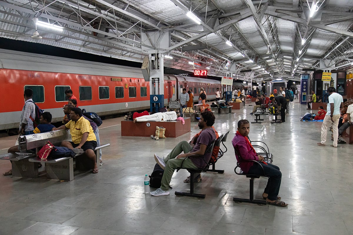 A crowded Indian railway platform during peak travel hours