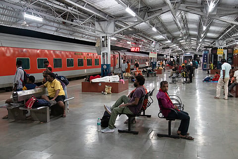 A crowded Indian railway platform during peak travel hours