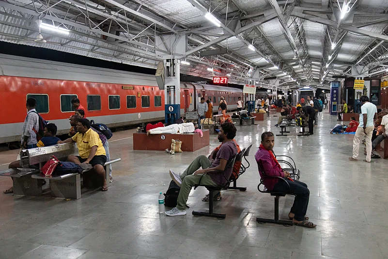 A crowded Indian railway platform during peak travel hours