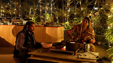 Couple preparing bajre ki roti at Padmaa, Jaipur