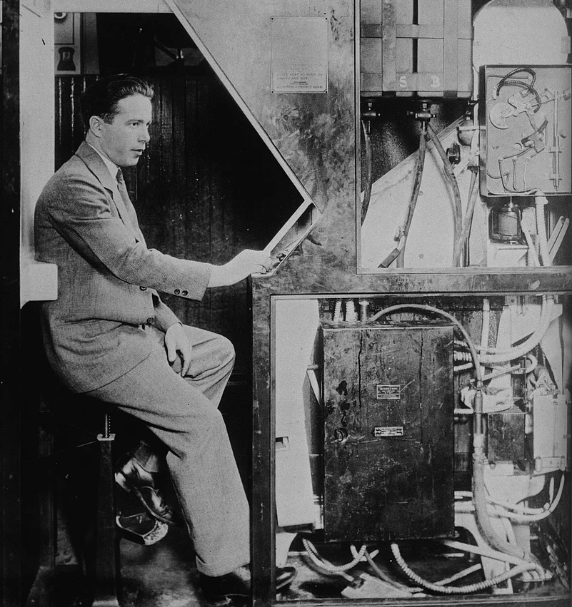 Anatol Josepho inside his photo booth in 1927