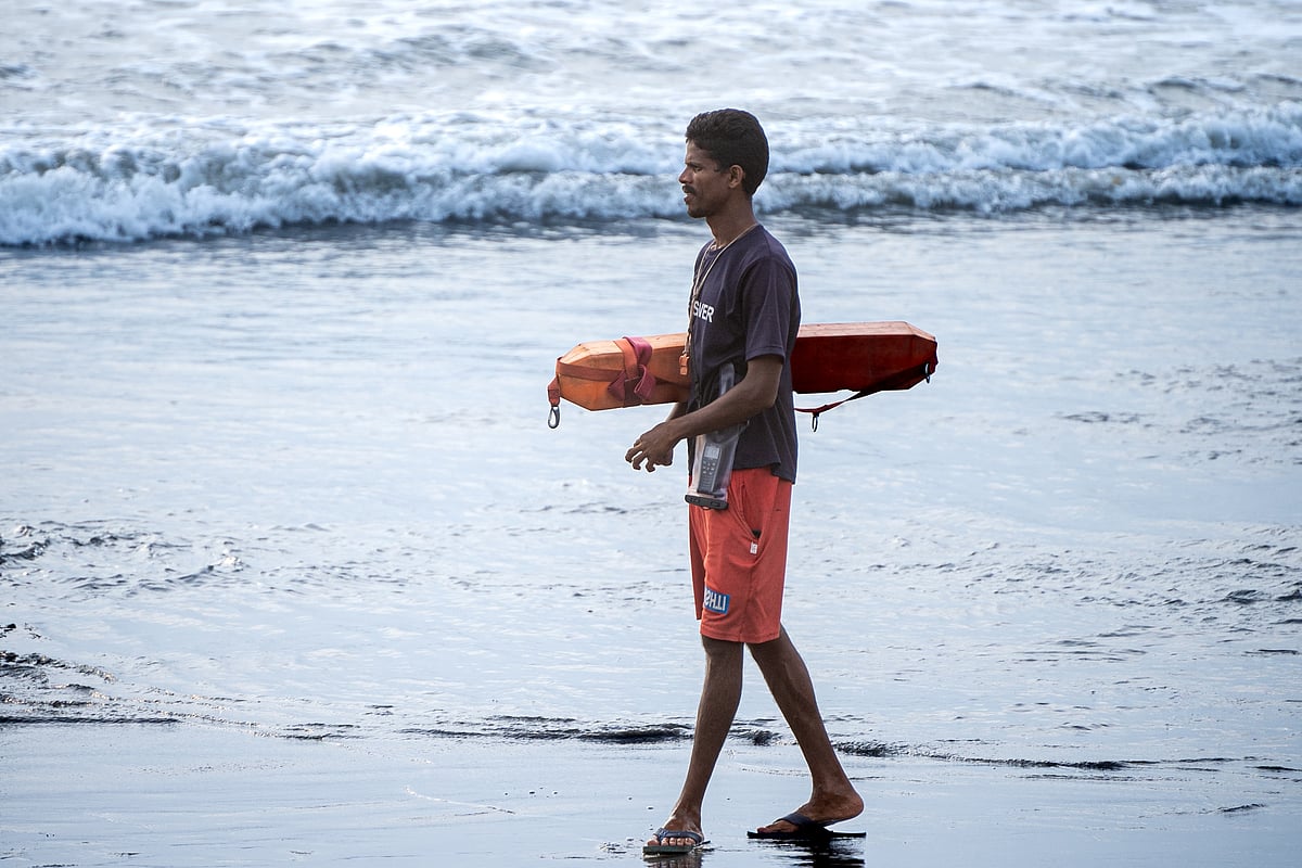A lifeguard on duty at a Goa beach