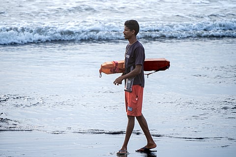 A lifeguard on duty at a Goa beach