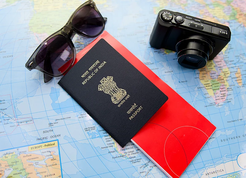 Travel essentials laid out for an international journey