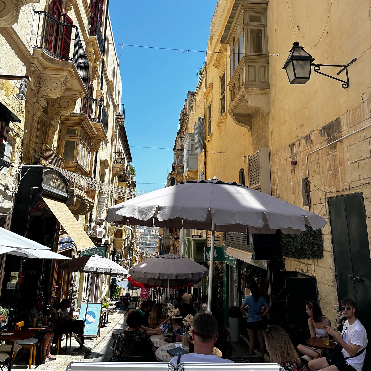 Valletta lanes unfolding toward the harbour