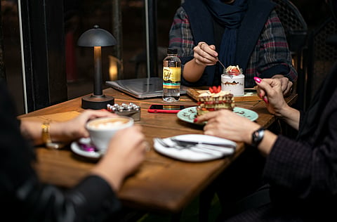 Friends enjoy a meal