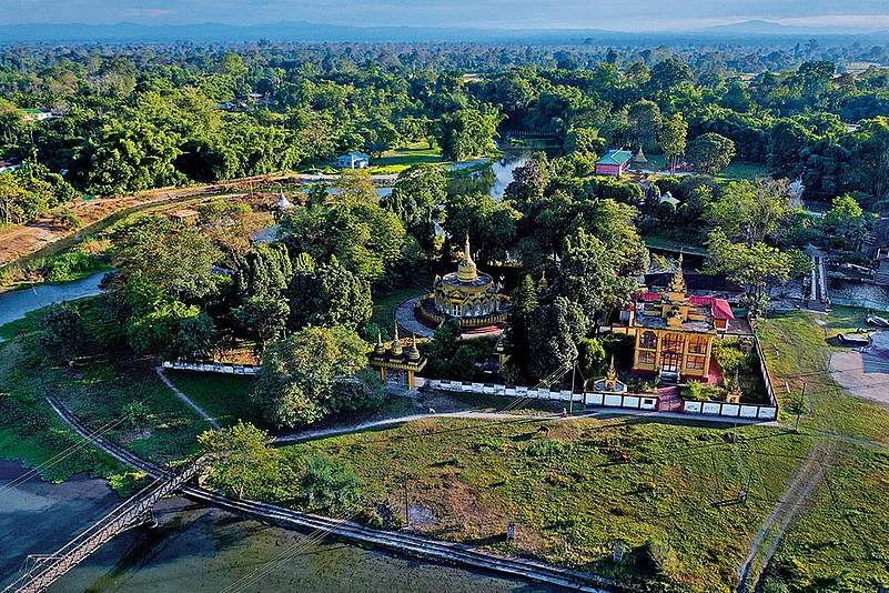 An aerial view of the river island in Chongkham, with the World Peace Pagoda visible at the centre
