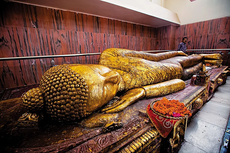 Reclining Buddha inside Kushinagar’s Parinirvana Stupa - Shutterstock