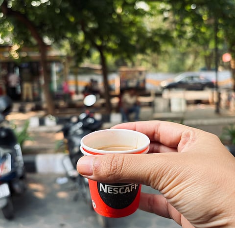 A quick chai break at a roadside stall in Bhubaneswar—my first taste of the city